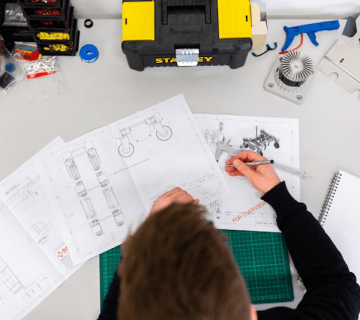 Engineers designing precision mold tooling